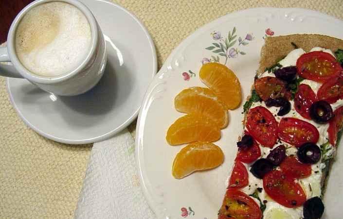 Goat Cheese, Black Olive And Arugula Pizza With Mandarin Orange Slices And Cappucino
